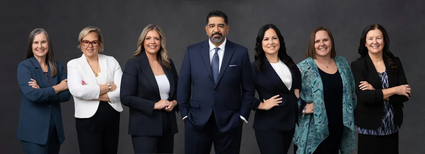 The seven members of the Perez Law Firm team